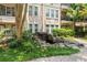 Multi-story building with well-maintained grounds including stone waterfall feature at 1850 Cotillion Dr Unit 3416, Atlanta, GA 30338