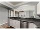 Bright kitchen featuring stainless steel appliances and granite countertops in an open concept design at 1850 Cotillion Dr Unit 3416, Atlanta, GA 30338