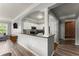 Bright kitchen featuring stainless steel appliances, granite countertops, with an open view to the brick hallway at 1850 Cotillion Dr Unit 3416, Atlanta, GA 30338