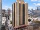 High rise condominium building in urban environment with cross streets and traffic at 300 Peachtree Ne St # 20 O, Atlanta, GA 30308