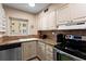 Kitchen features granite countertops, stainless steel appliances, and ample cabinet space at 300 Peachtree Ne St # 20 O, Atlanta, GA 30308