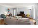 Spacious living room boasts comfortable seating, hardwood floors, and natural light at 300 Peachtree Ne St # 20 O, Atlanta, GA 30308