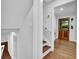 Entryway with hardwood floors, stairs, wooden front door with windows, and white walls at 4669 Dunover Cir, Atlanta, GA 30360