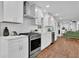 Well-equipped kitchen featuring stainless steel appliances, white marble countertops, and a subway tile backsplash at 4669 Dunover Cir, Atlanta, GA 30360