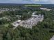 Aerial view of a residential community in Woodstock, GA, surrounded by lush greenery at 499 Bishop Ln, Woodstock, GA 30188