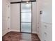 Custom closet with a sliding glass door and built in storage at 499 Bishop Ln, Woodstock, GA 30188