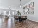 The dining area offers great lighting and includes a stylish table set against a decorative wall at 499 Bishop Ln, Woodstock, GA 30188