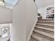 Inviting home entry featuring staircase, front door, and decor; creating a warm welcome at 499 Bishop Ln, Woodstock, GA 30188