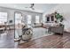 This bright living area includes stylish furnishings, hardwood floors, and a relaxing atmosphere at 499 Bishop Ln, Woodstock, GA 30188