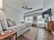 Bright and airy main bedroom with tray ceiling, wood floors, and contemporary decor at 499 Bishop Ln, Woodstock, GA 30188