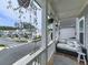Inviting porch with comfortable seating and views of the neighborhood, perfect for relaxing and enjoying the outdoors at 499 Bishop Ln, Woodstock, GA 30188