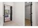 Hallway leading to a large bedroom and closet, all with hardwood floors at 3208 Spruce Way, Atlanta, GA 30349