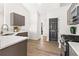 View of the contemporary kitchen featuring stainless steel appliances, undermount sink and matte finish cabinets at 3208 Spruce Way, Atlanta, GA 30349