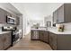 A new kitchen includes updated appliances and quartz countertops at 3208 Spruce Way, Atlanta, GA 30349