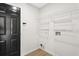 Laundry room featuring storage shelves at 3208 Spruce Way, Atlanta, GA 30349