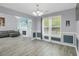 Inviting living room with a comfortable sofa, a fireplace, and ample natural light at 3419 Allie Dr, Snellville, GA 30039