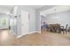 Hallway leading to dining room with a table set for a meal, showing spaciousness of the home at 588 Joneus Dr, Mcdonough, GA 30252