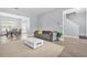 Living room and dining area featuring modern furniture and natural light at 588 Joneus Dr, Mcdonough, GA 30252