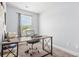 Bright office with natural light, desk, rolling chair, and carpeted floor at 588 Joneus Dr, Mcdonough, GA 30252