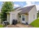 Backyard with a small patio, grill, and privacy fence, perfect for outdoor relaxation and entertainment at 6178 Field Stone Dr, Douglasville, GA 30134