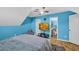 Bedroom with blue walls, ceiling fan, and an en-suite bathroom at 6178 Field Stone Dr, Douglasville, GA 30134