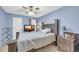Cozy bedroom featuring a ceiling fan, and warm wall color at 6178 Field Stone Dr, Douglasville, GA 30134
