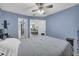 Stylish bedroom featuring a bed, and view of the living room at 6178 Field Stone Dr, Douglasville, GA 30134