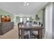 Inviting dining area with a large table, ample seating, and stylish furnishings at 6178 Field Stone Dr, Douglasville, GA 30134