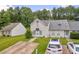Charming home with inviting exterior, driveway, green lawn, and plenty of parking at 6178 Field Stone Dr, Douglasville, GA 30134