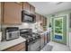 Well-equipped kitchen with modern appliances, and a convenient layout at 6178 Field Stone Dr, Douglasville, GA 30134