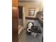 A compact bathroom featuring black fixtures and tilework surrounding the sink and toilet at 718 South Ave, Forest Park, GA 30297