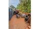 A well-furnished backyard including patio furniture, decor, and a gas heater at 751 Stonecreek Way, Stone Mountain, GA 30087