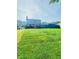 Expansive backyard with a deck and privacy fence, providing ample space for relaxation and entertainment at 751 Stonecreek Way, Stone Mountain, GA 30087