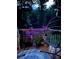 Tranquil backyard oasis with comfortable egg chair swing, lush greenery, and inviting ambiance for outdoor relaxation at 751 Stonecreek Way, Stone Mountain, GA 30087