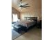 Spacious bedroom featuring a king-sized bed, plush carpeting, and ample natural light, creating a cozy atmosphere at 751 Stonecreek Way, Stone Mountain, GA 30087