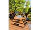 Relaxing deck featuring comfortable swing chairs and views of the surrounding greenery at 751 Stonecreek Way, Stone Mountain, GA 30087
