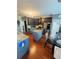 Modern kitchen with granite countertops, stainless steel appliances, and a center island for food preparation at 751 Stonecreek Way, Stone Mountain, GA 30087