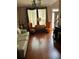 Inviting living room with hardwood floors, comfortable seating, and stylish decor, perfect for relaxation and entertaining at 751 Stonecreek Way, Stone Mountain, GA 30087