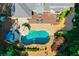 Aerial view showcasing a kidney shaped pool, with patio and deck at 830 Club Chase Ct, Roswell, GA 30076
