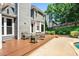 Spacious wooden deck overlooking a lush backyard, perfect for outdoor entertaining at 830 Club Chase Ct, Roswell, GA 30076