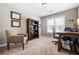 This office features a dark wood desk, an office chair, and a bookcase at 830 Club Chase Ct, Roswell, GA 30076