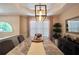 Beautiful dining area featuring a marble table, modern chandelier, and designer touches at 85 Eastwood Frst, Covington, GA 30014