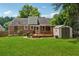 Well maintained backyard with shed, grill and deck at 2432 Saint Patrick Se St, Atlanta, GA 30317