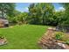 A large, well-maintained lawn with a garden area at 2432 Saint Patrick Se St, Atlanta, GA 30317