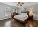 Comfortable bedroom with hardwood floors, windows, and neutral tones offering a relaxing retreat at 2432 Saint Patrick Se St, Atlanta, GA 30317