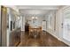Inviting dining room with rich hardwood floors and natural light, perfect for gatherings at 2432 Saint Patrick Se St, Atlanta, GA 30317