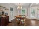 Cozy dining room with a wooden table, stylish chairs, and ample natural light at 2432 Saint Patrick Se St, Atlanta, GA 30317