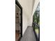 Private balcony overlooking a lush green landscape and is accessible from the main bedroom at 1155 Peachtree Battle Nw Ave, Atlanta, GA 30327