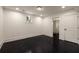 Bedroom with painted concrete floors and ensuite bathroom at 1155 Peachtree Battle Nw Ave, Atlanta, GA 30327
