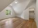 Bright bonus room featuring hardwood flooring, an open closet, and natural light at 1155 Peachtree Battle Nw Ave, Atlanta, GA 30327